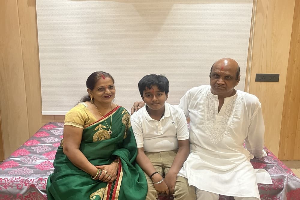Shashi Kant Gupta(R) with his wife and grandson